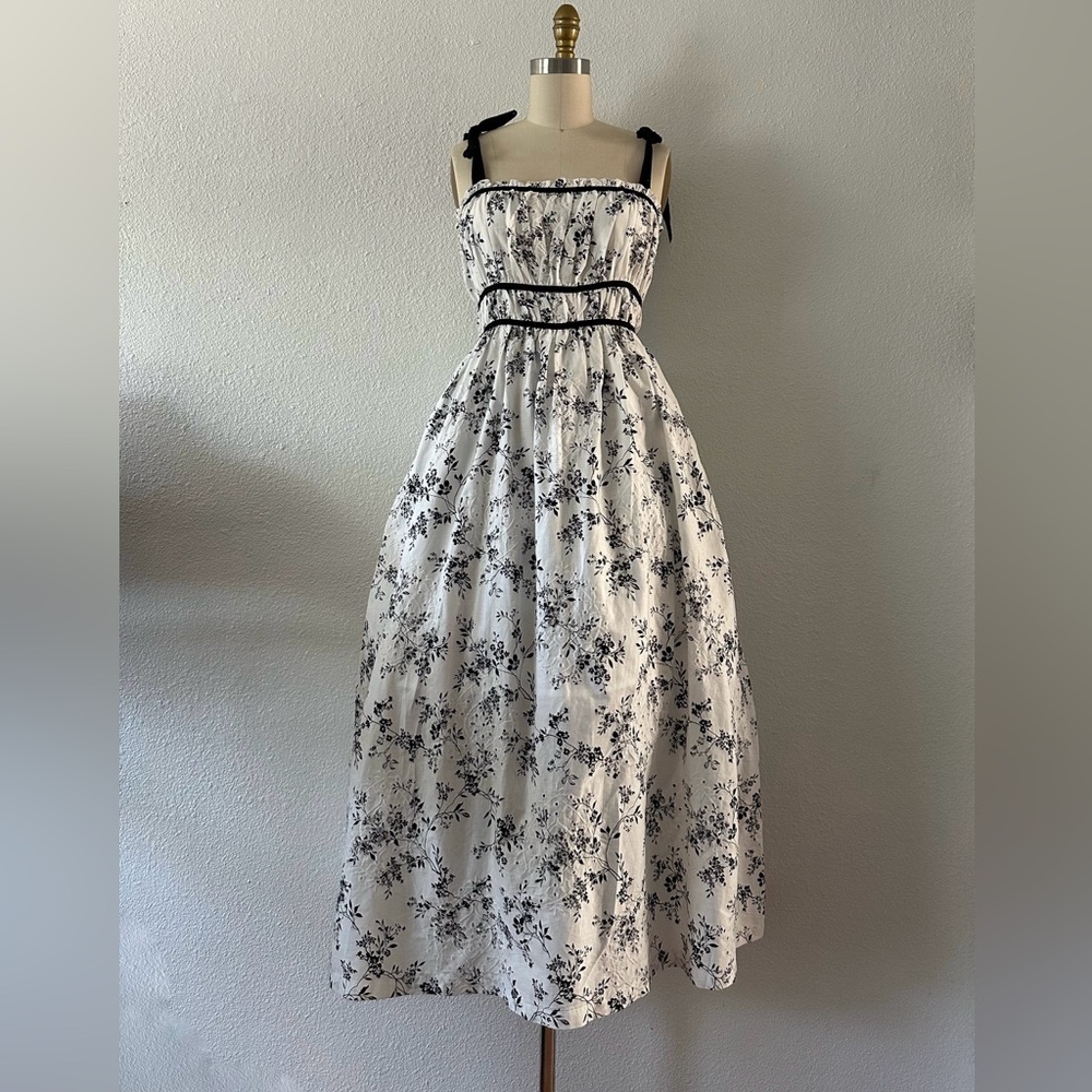NWT White floral eyelet dress with adjustable straps.